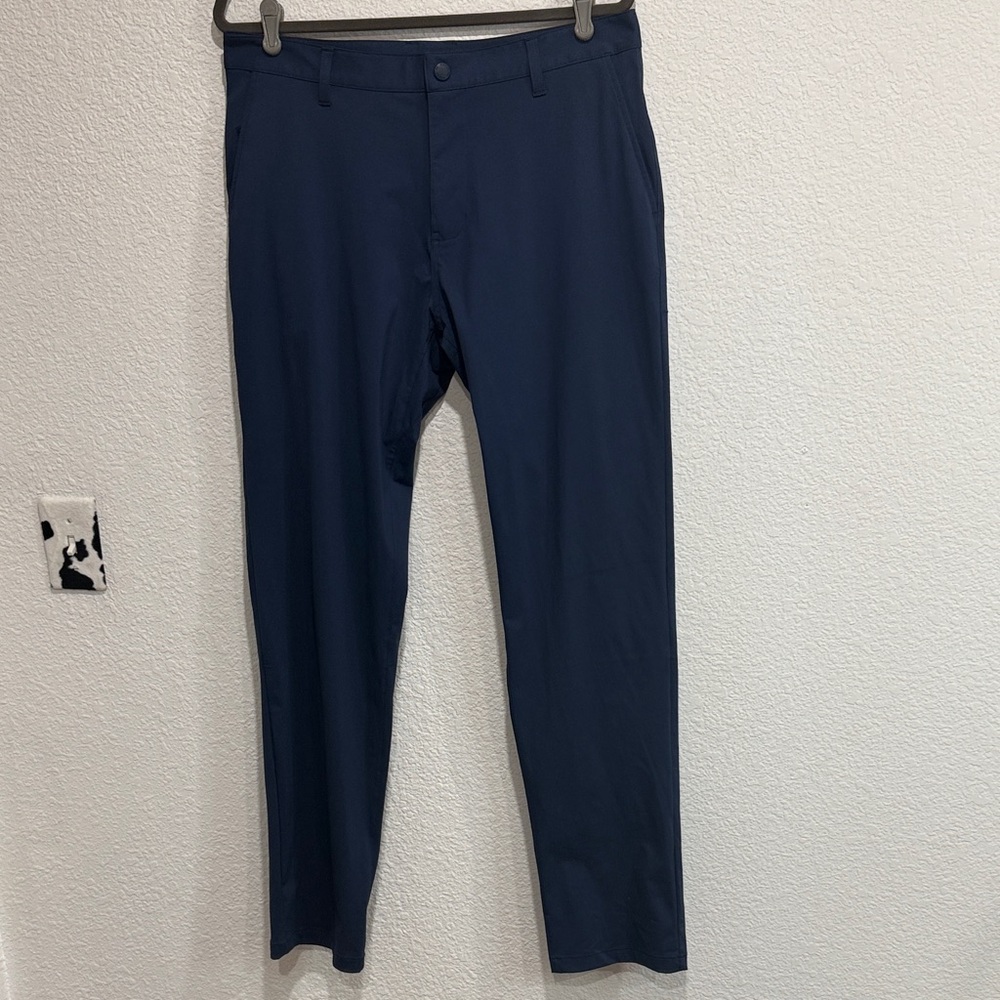 Rhone Commuter Mens Blue Straight Fit Travel Work Flat Front Snap Pants 34